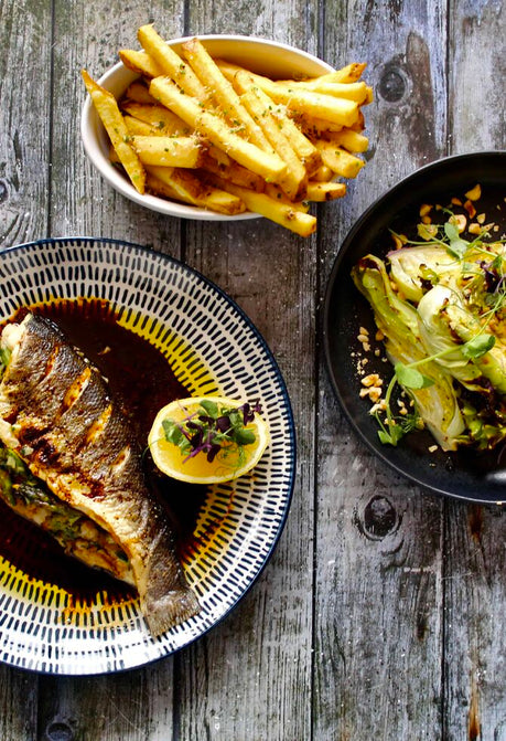 Baked Sea Bass with Truffle Parmesan Fries & Roasted Cabbage