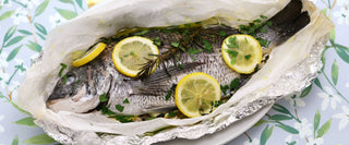 Whole sea bream cooked en papillote